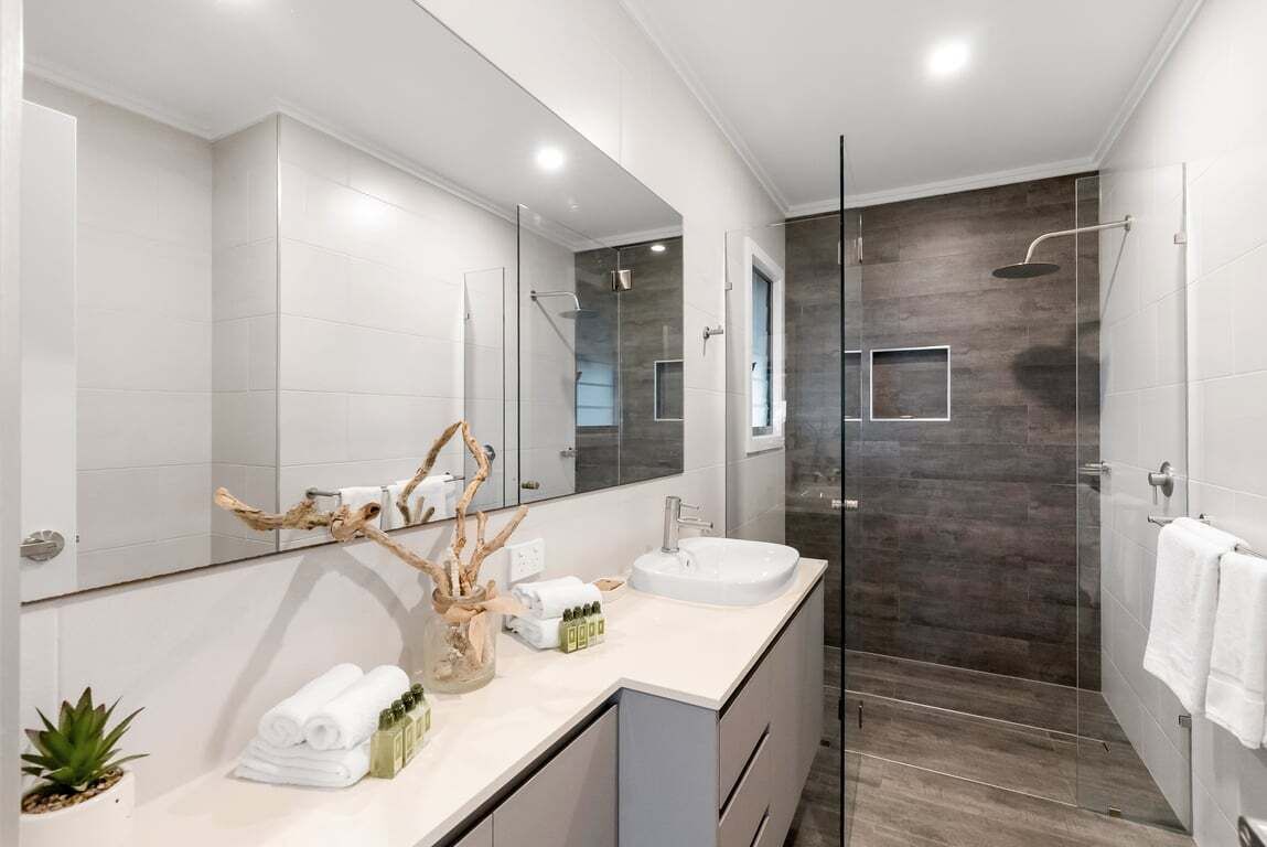 Bathtub, hair dryer, towels, soap