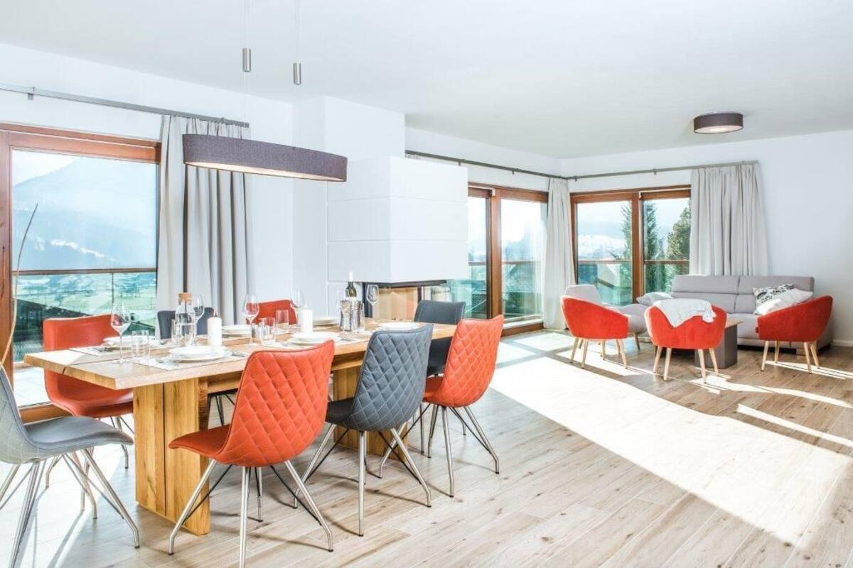 Deluxe Apartment | Living area | 120-inch TV with cable channels, heated floors