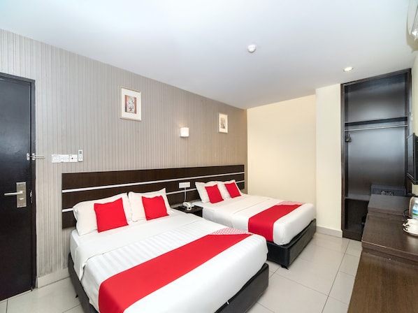 Suite Keluarga | 1 kamar tidur, meja kerja, Wi-Fi gratis, dan seprai linen