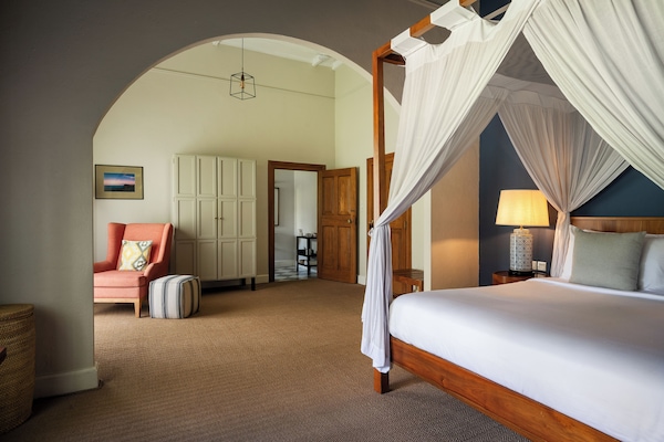 Demodara Bedroom | Premium bedding, in-room safe, individually decorated