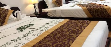 Standard Quadruple Room, Non Smoking | Minibar, desk, free WiFi