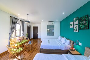 Quarto família | Frigobar, escrivaninha, cortinas blackout, quartos à prova de som