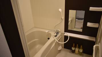Room (Boutique Hotel) | Bathroom | Combined shower/tub, free toiletries, hair dryer, slippers