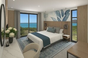 Un dormitorio moderno con una cama grande, vistas al mar y un cabecero de madera.