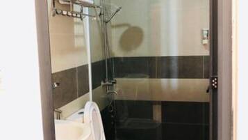 Shower, free toiletries, slippers, towels