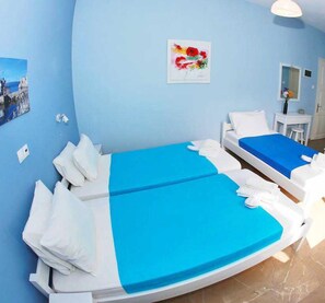 Kamar Triple | Setrika/meja setrika, Wi-Fi gratis, dan seprai linen