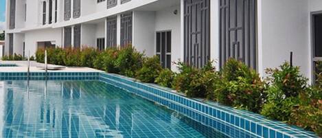 Outdoor pool, pool umbrellas, pool loungers