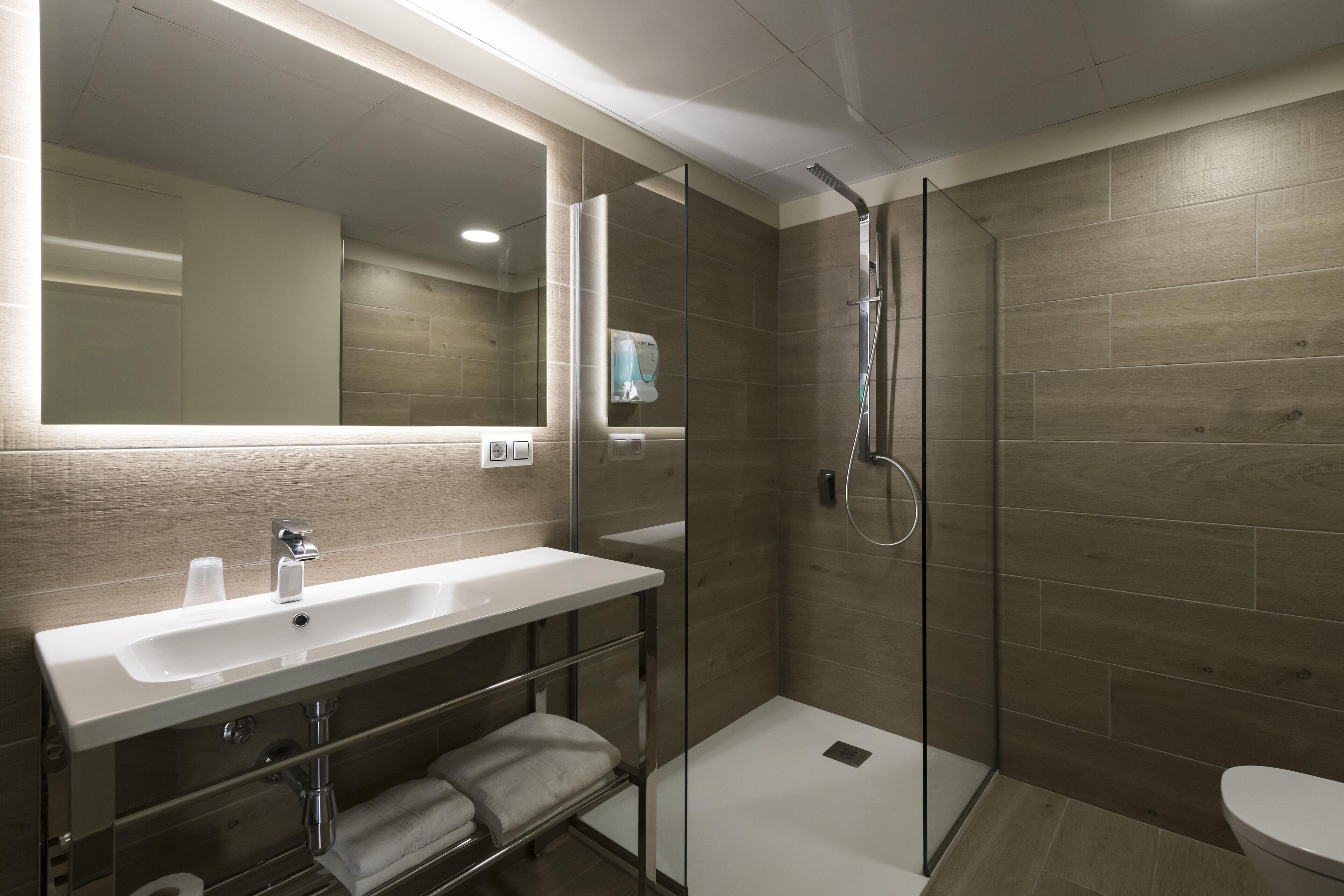 shower, eco-friendly toiletries, hair dryer, towels