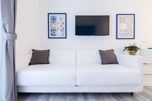 高级房 (Capri) | 高档床上用品、羽绒被、迷你吧、客房内保险箱