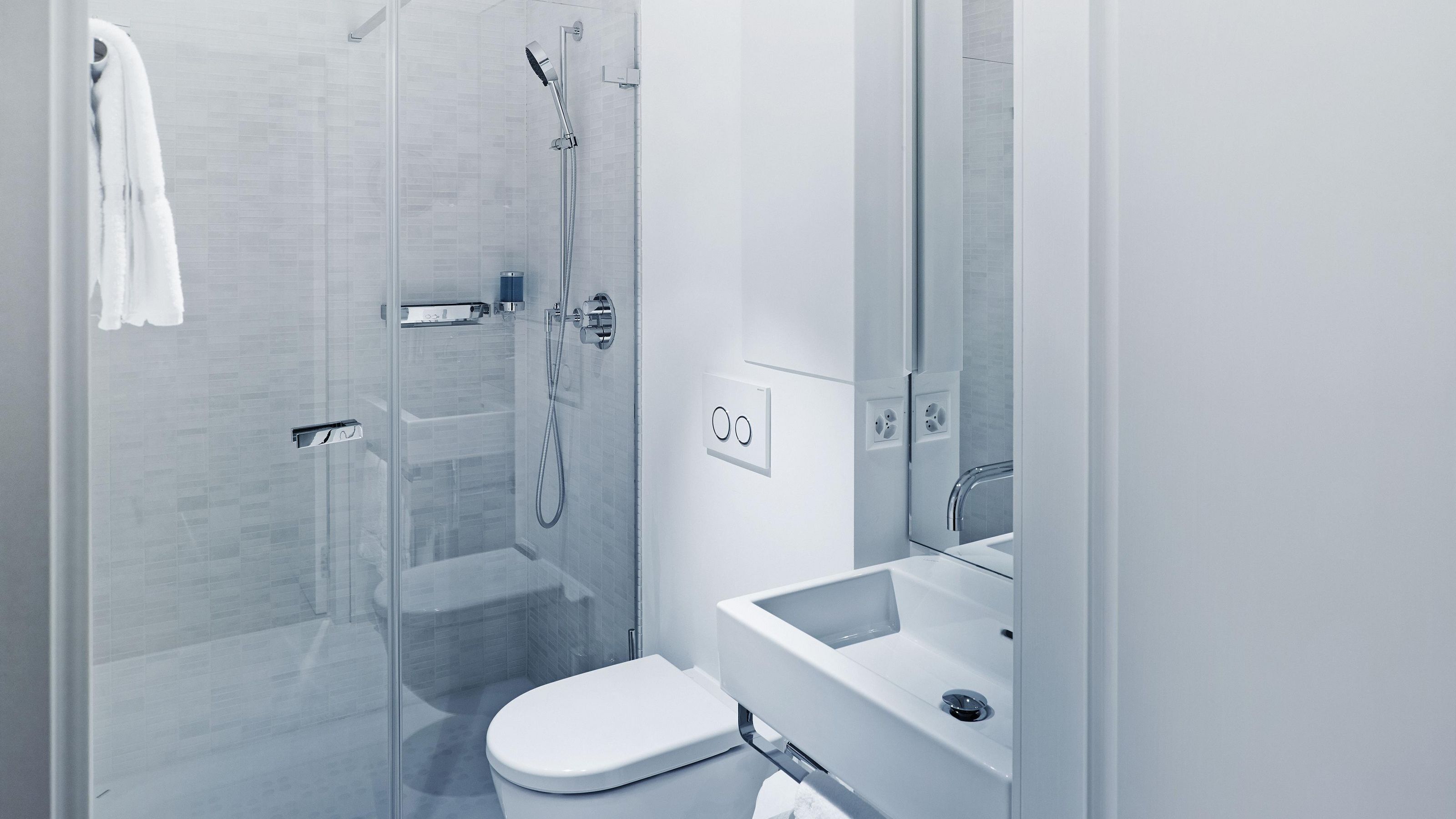 family room | bathroom | designer toiletries, hair dryer, bathrobes, slippers