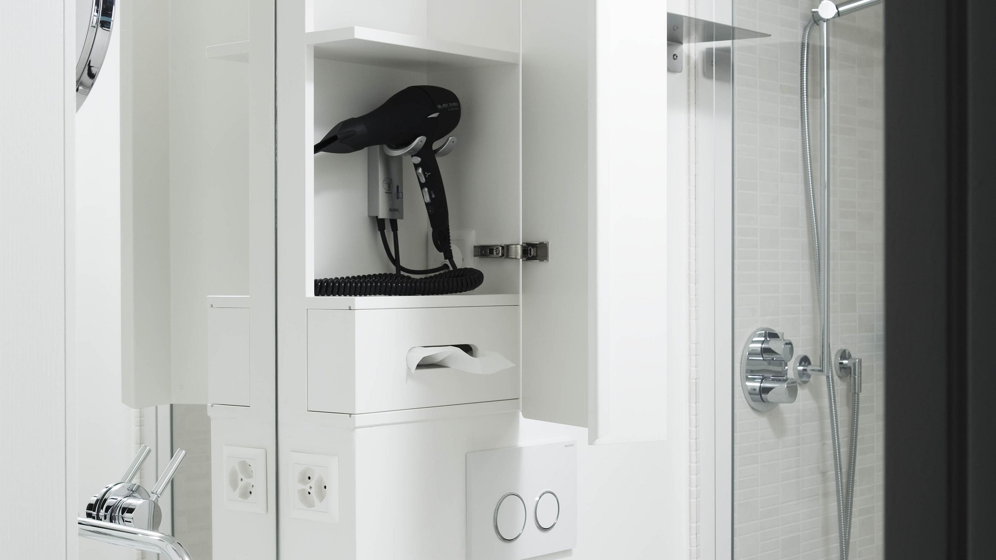 business single room | bathroom | designer toiletries, hair dryer, bathrobes, slippers