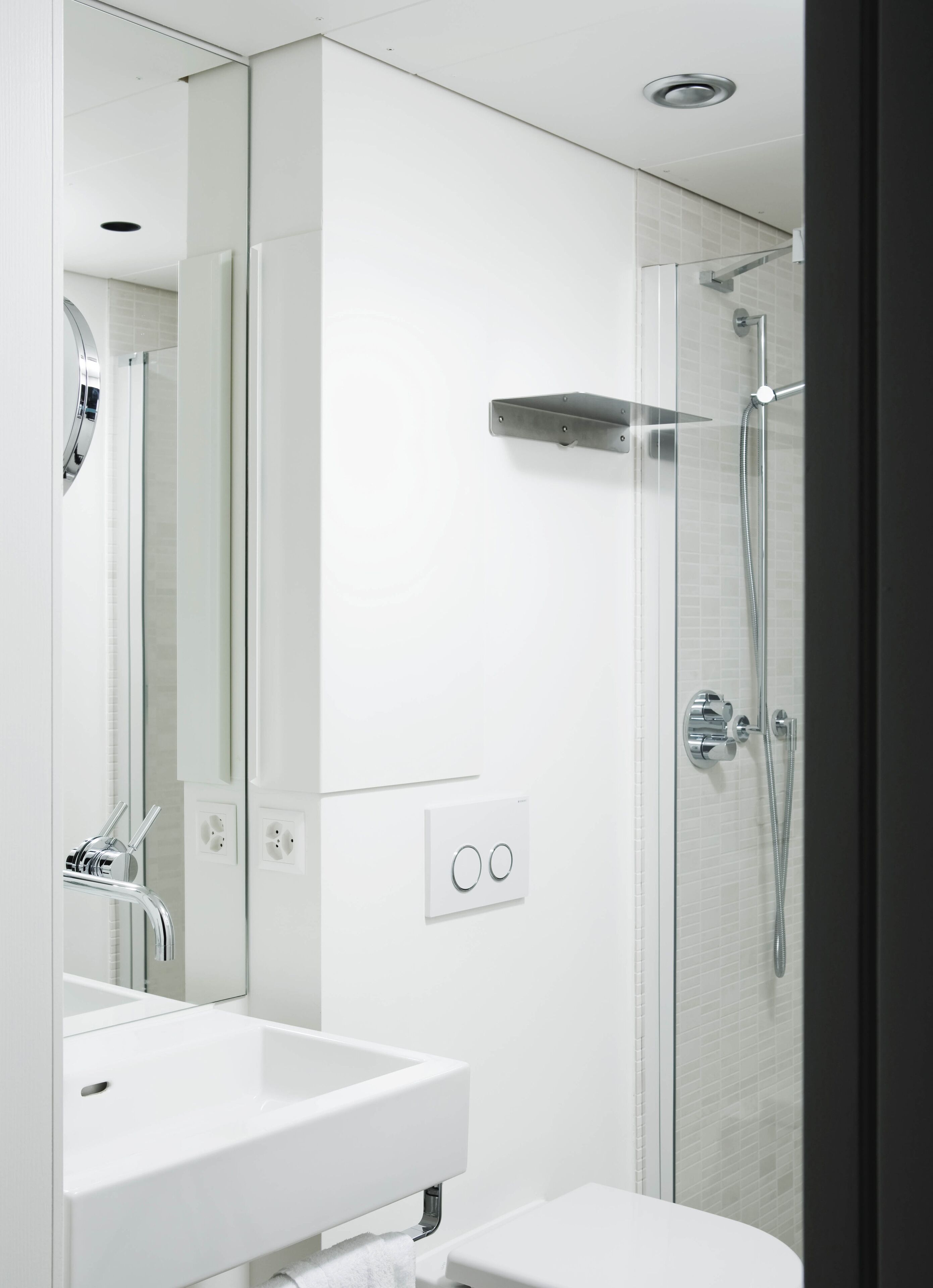 designer toiletries, hair dryer, bathrobes, slippers