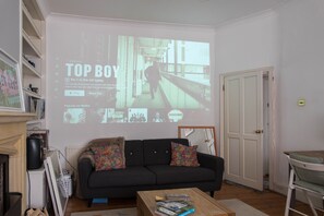 Apartment (1 Bedroom) | Living room | Flat-screen TV, fireplace, Netflix, DVD player - Beautiful 1-br Flat With Garden in Stoke Newington (London)