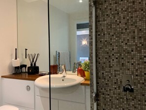 Bathtub, hair dryer, towels, soap