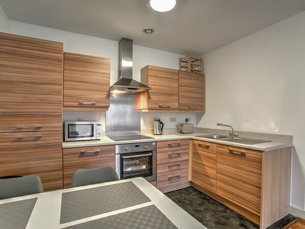 Departamento (2 Bedrooms) | Cocina privada | Refrigerador, microondas, horno y lavavajillas