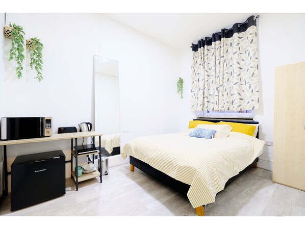 Estudio (1 Bedroom) | 1 habitación, tabla de planchar con plancha, wifi gratis y ropa de cama