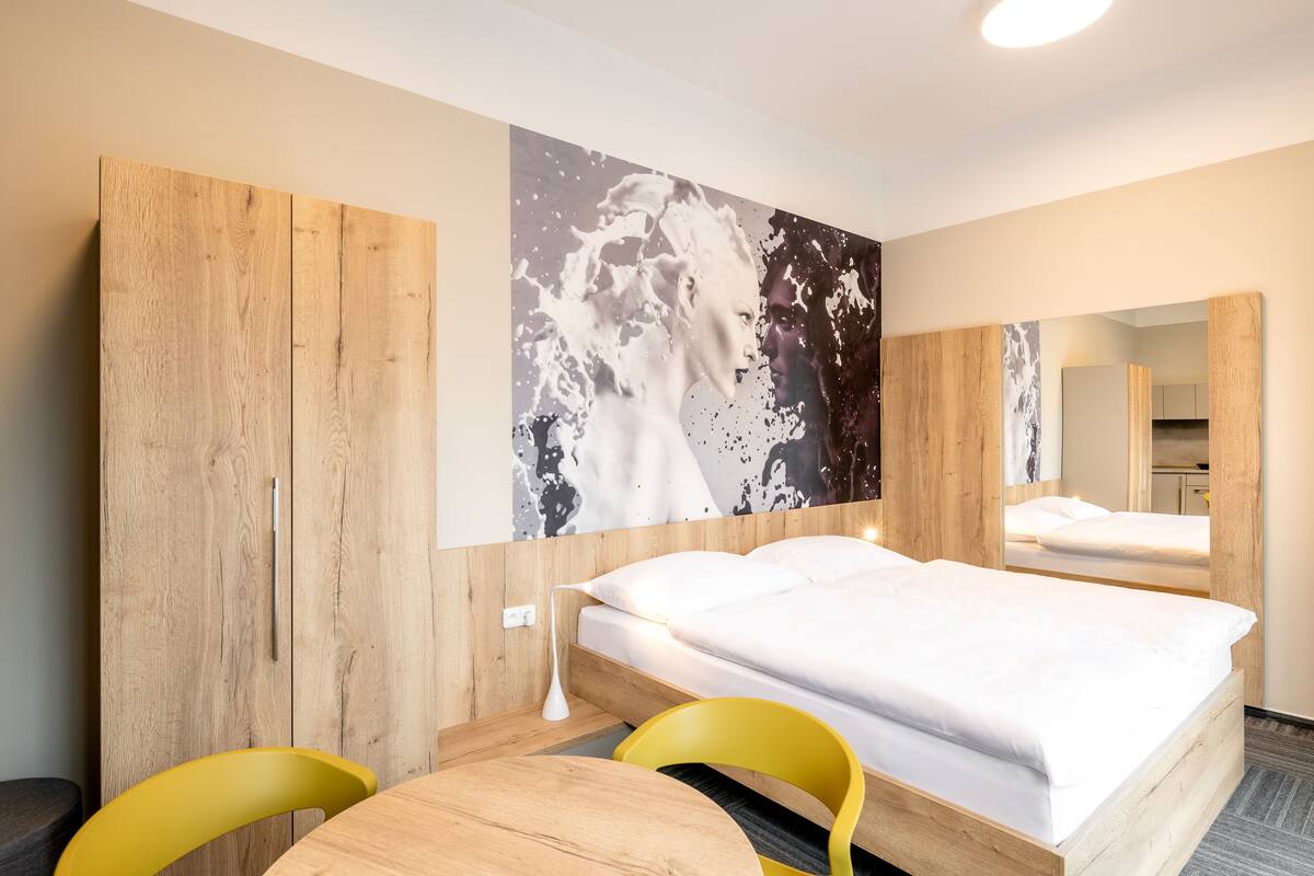 Select Comfort beds, laptop workspace, blackout drapes, soundproofing