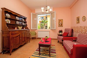 32-inch flat-screen TV with satellite channels, TV