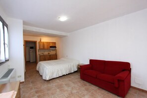 Estudio | Tabla de planchar con plancha, wifi gratis y ropa de cama