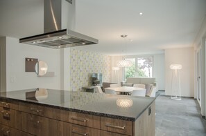 Apartment, 2 Bedrooms | Private kitchen | Full-sized fridge, oven, stovetop, dishwasher - Apartment JungfrauCenter Brienzersee (Interlaken)