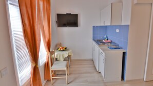 Standard Studio, 1 Queen Bed, Partial Sea View | In-room dining - Apartments Cenic (Becici)