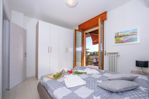 Apartamento standard, vários quartos (Casa dei Quadri) | 2 quartos, ferros/tábuas de passar roupa, Wi-Fi de cortesia