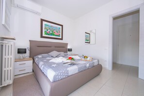 Appartement Standard, 2 chambres, balcon (Casa dei Quadri) | 2 chambres, fer et planche à repasser, literie fournie