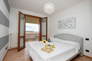 Apartemen Keluarga, beberapa kamar (Appartamento Vista Lago) | 1 kamar tidur, setrika/meja setrika, Wi-Fi gratis, dan seprai linen