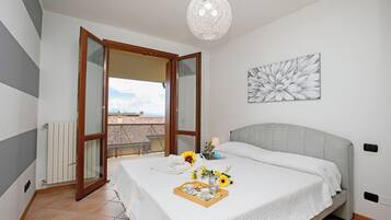 Family Apartment, 1 Bedroom (Appartamento Vista Lago) | 1 bedroom, iron/ironing board, free WiFi, bed sheets