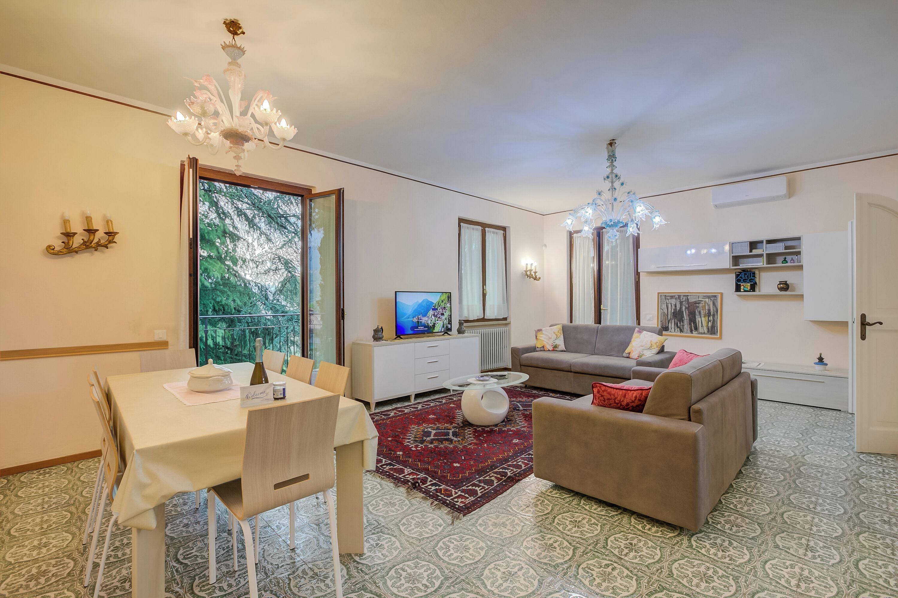 Family Villa, Multiple Bedrooms (Villa Alberti 900m from Garda lake) | Living area | 21-inch Smart TV with cable channels