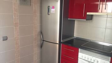 Een koelkast, een oven, een vaatwasser