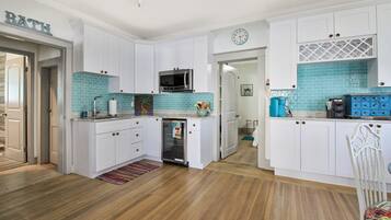 Fridge, microwave, coffee/tea maker, toaster