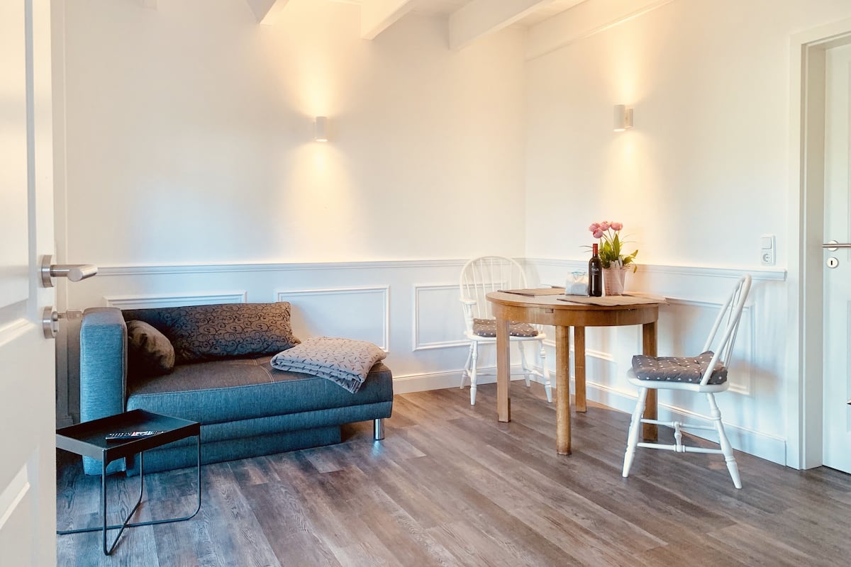 Suite (White) | Living room | Flat-screen TV