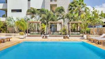 Outdoor pool, open 8:00 AM to 8:00 PM, free pool cabanas, pool loungers