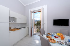 Apartment, 2 Bedrooms, Balcony | Living area | 32-inch flat-screen TV with digital channels, TV