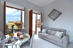 Apartment, 2 Bedrooms, Balcony | Living area | 32-inch flat-screen TV with digital channels, TV