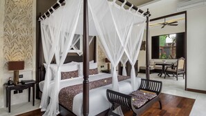 A four-poster bed with a canopy, a wooden bench, a table, and a view of an outdoor area. - 5 Star Villa for Rent in Bali, Bali Villa 2078 (Bali)