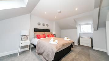Departamento | 1 habitación, tabla de planchar con plancha, wifi gratis y ropa de cama