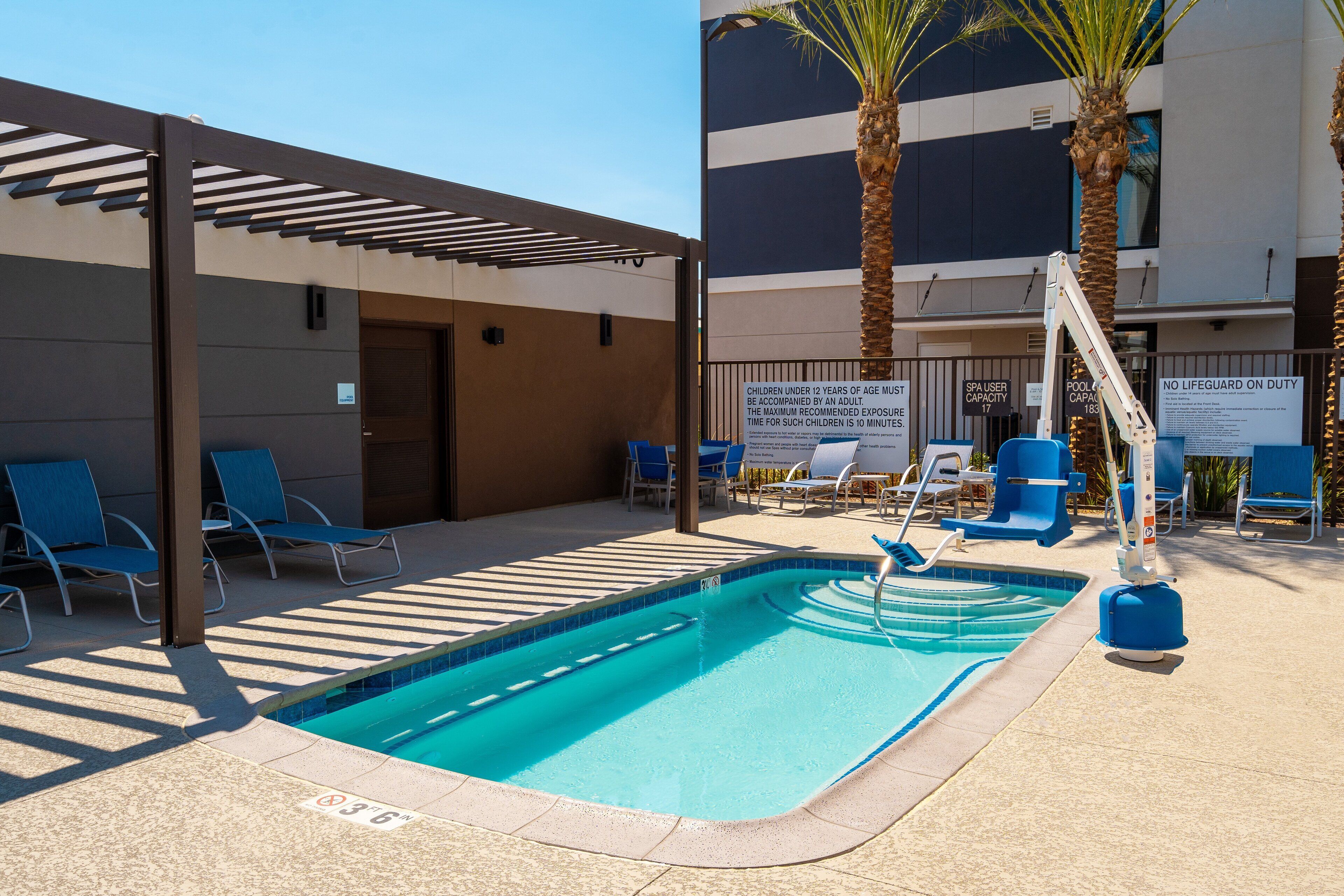 outdoor pool, open 8:00 am to 11:00 pm, pool loungers