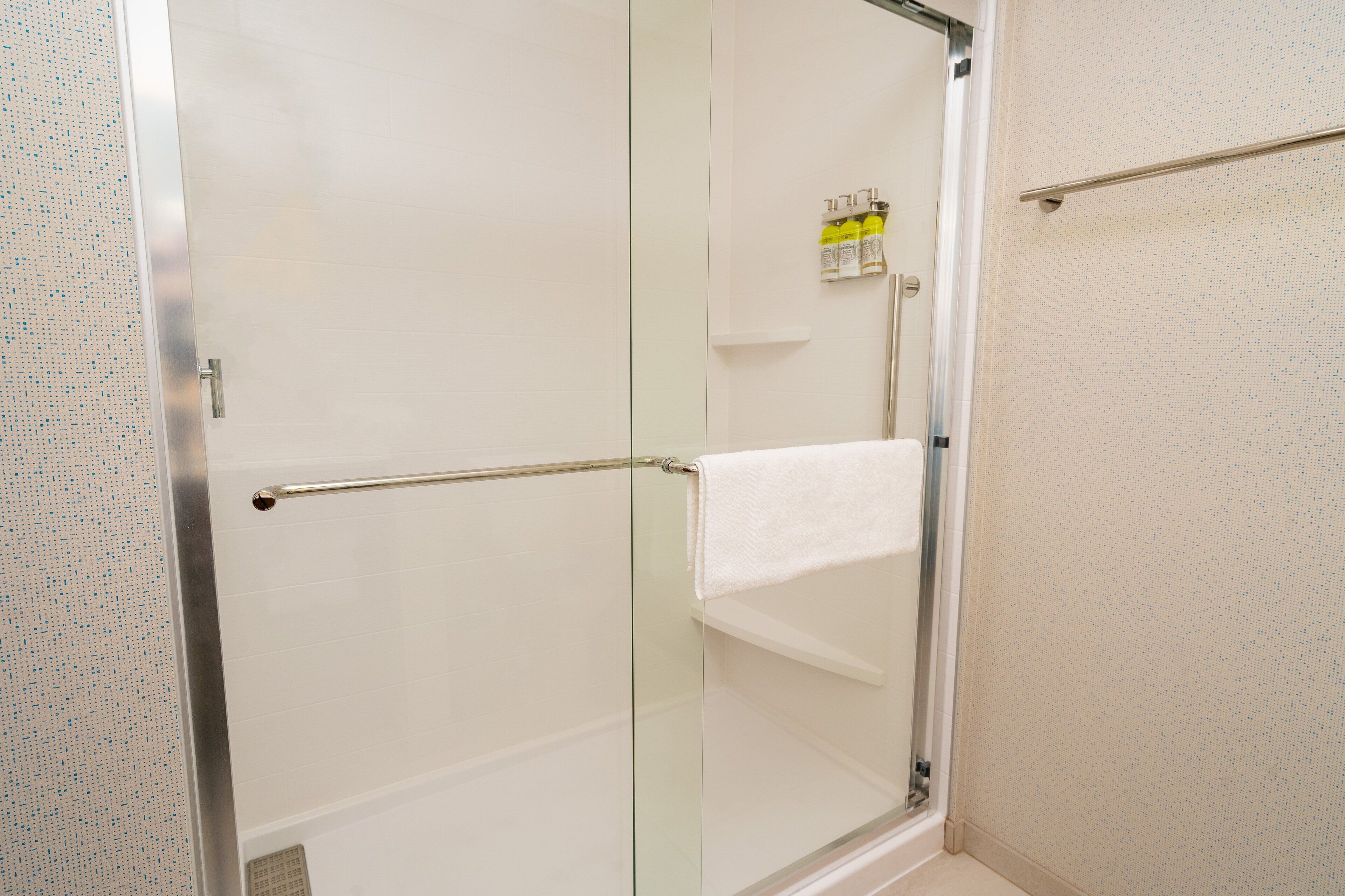 separate bathtub and shower, free toiletries, hair dryer, towels