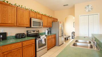 House (87285 7 Bedroom Pool Home,Cumbrian La) | Private kitchen | Fridge, microwave, oven, stovetop