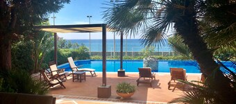 Luxury seafront villa with pool