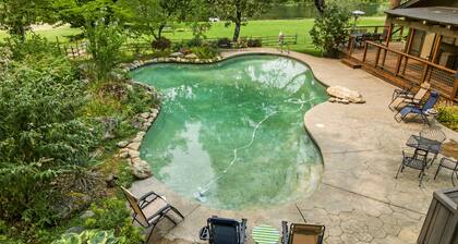 Rogue River frontage: private deck & hot tub, exciting interior, river dock, FUN