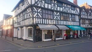 A traditional half-timbered building with a Thai restaurant on the ground floor. - 47 Wetherby Way (Stratford-upon-Avon)