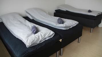 Family Quadruple Room, Shared Bathroom (3) | Down comforters, individually decorated, individually furnished, desk