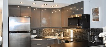 Steps from bluebill beach with stunning sunsets from your balcony.