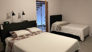 Double Room (Tipanie Room) | Blackout drapes, soundproofing, iron/ironing board (on request) - Tara Tahiti Lodge (Pirae)