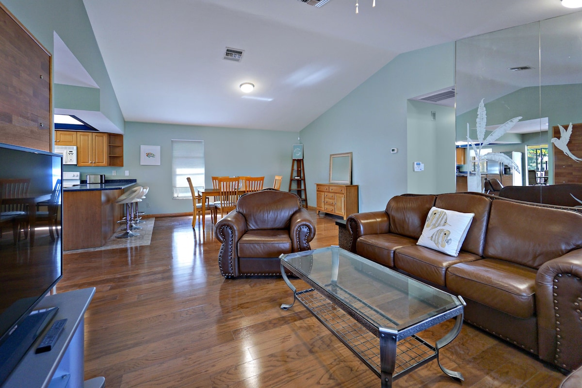 Photo 10 of Amazing 4 Bedroom 3 Bath Pool Home. About 1 mile from the Beach and Great Eats