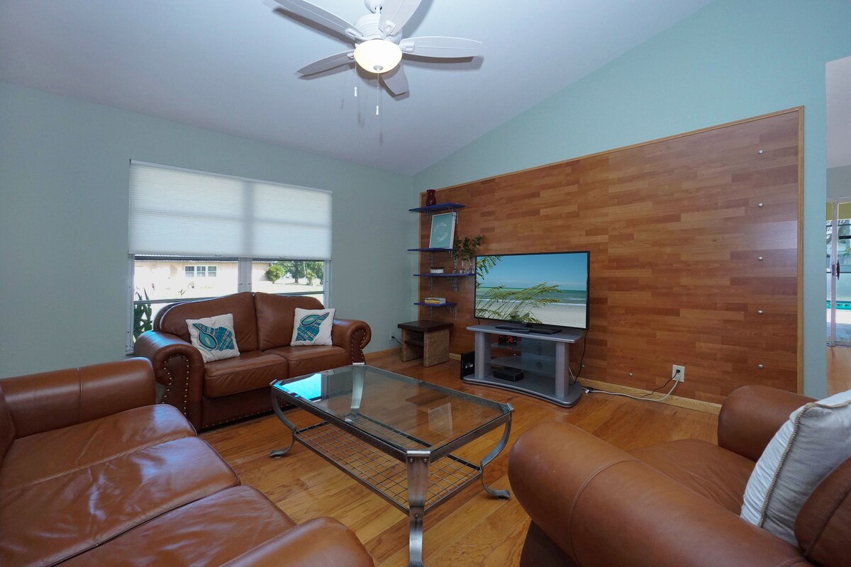 Photo 8 of Amazing 4 Bedroom 3 Bath Pool Home. About 1 mile from the Beach and Great Eats