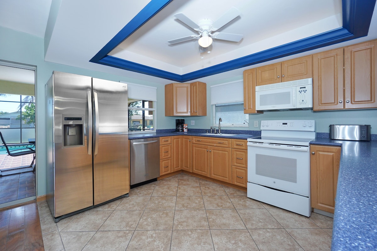 Photo 12 of Amazing 4 Bedroom 3 Bath Pool Home. About 1 mile from the Beach and Great Eats